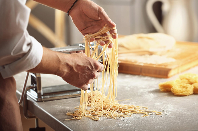 Fresh noodles being made by hand